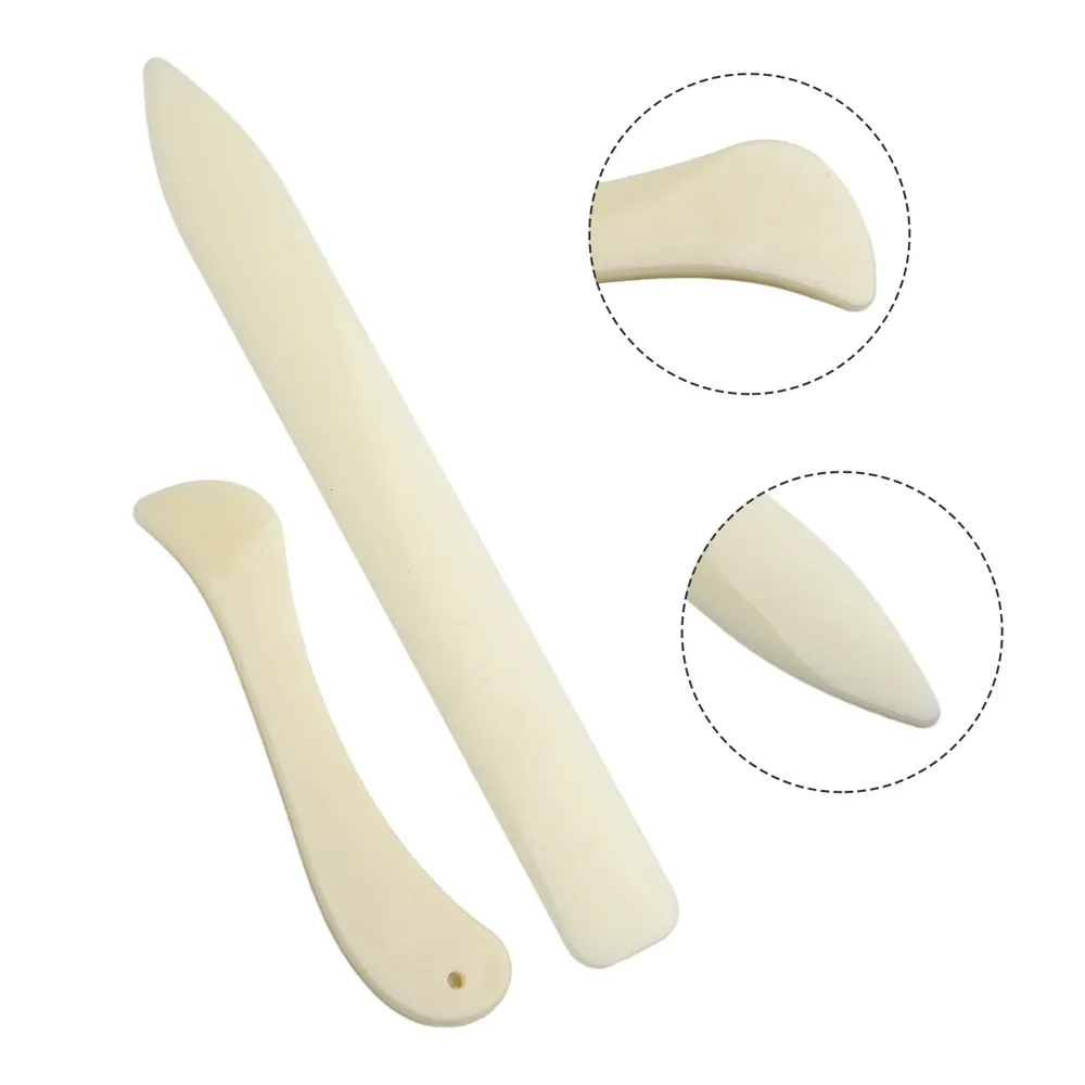 2 outils plioirs en os pour maroquinerie