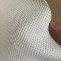 Cuir synthétique microfibre perforé 1,2 mm pour automobile – Couleur White semi Punching