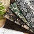 Tissu PU motif serpent 3D pour vêtement – 1