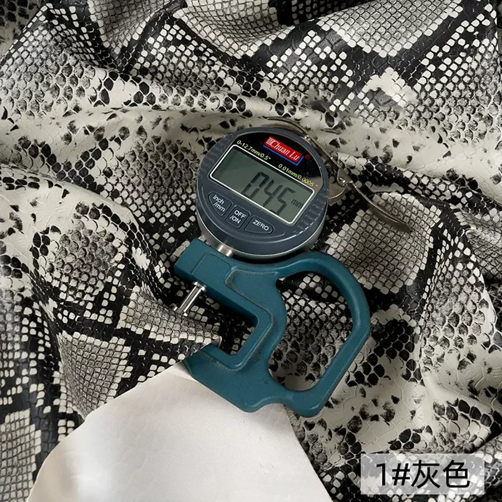 Tissu PU motif serpent 3D pour vêtement