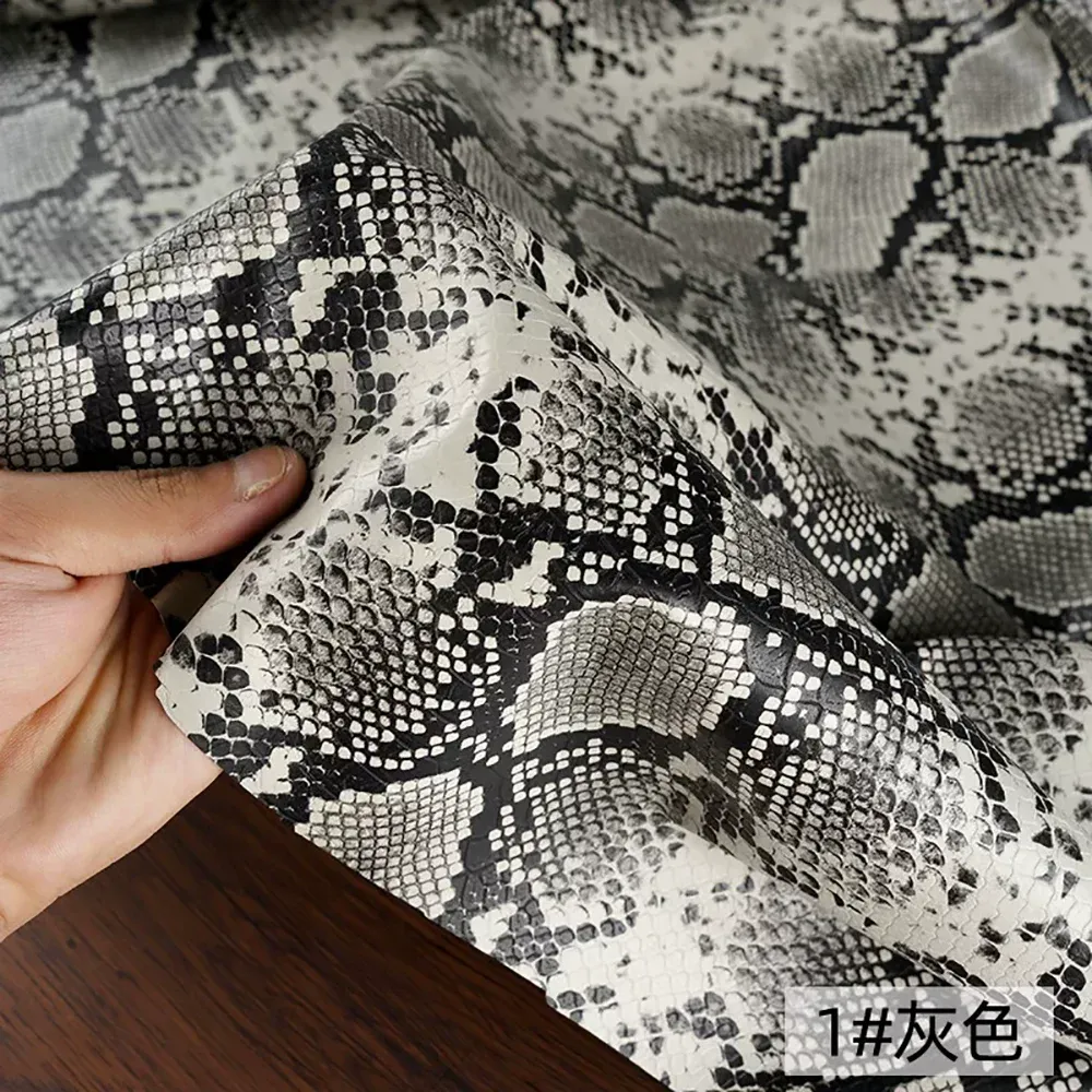 Tissu PU motif serpent 3D pour vêtement
