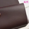 Tissu PU souple motif litchi imperméable 100 à 140 cm – Color Marron et noir