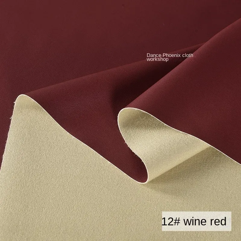 Tissu PU souple rouge vin 100 à 140 cm