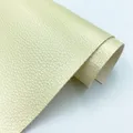 Tissu similicuir PU Litchi 20 x 30 cm imperméable – Couleur 23 Light gold
